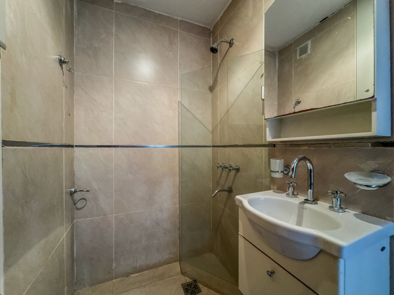 Departamento 2 Dorm + Cochera en Macrocentro | Piso 10 con Vista Abierta