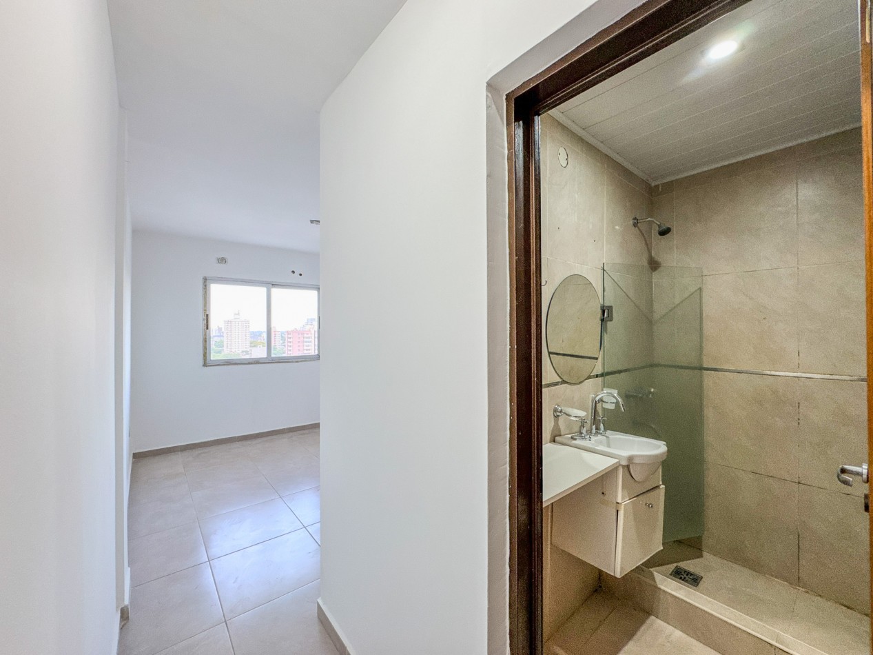 Departamento 2 Dorm + Cochera en Macrocentro | Piso 10 con Vista Abierta