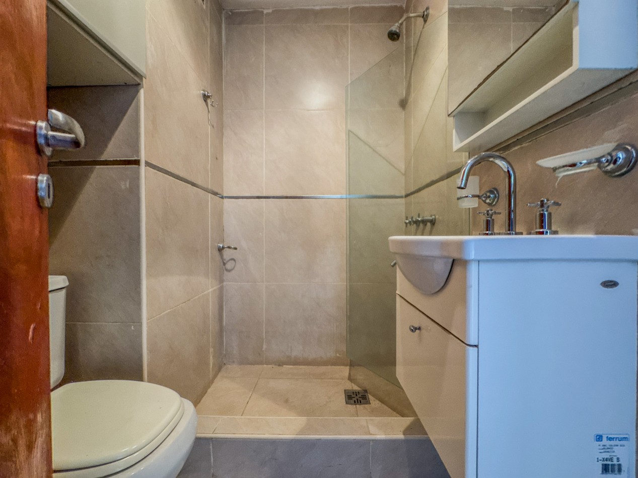 Departamento 2 Dorm + Cochera en Macrocentro | Piso 10 con Vista Abierta