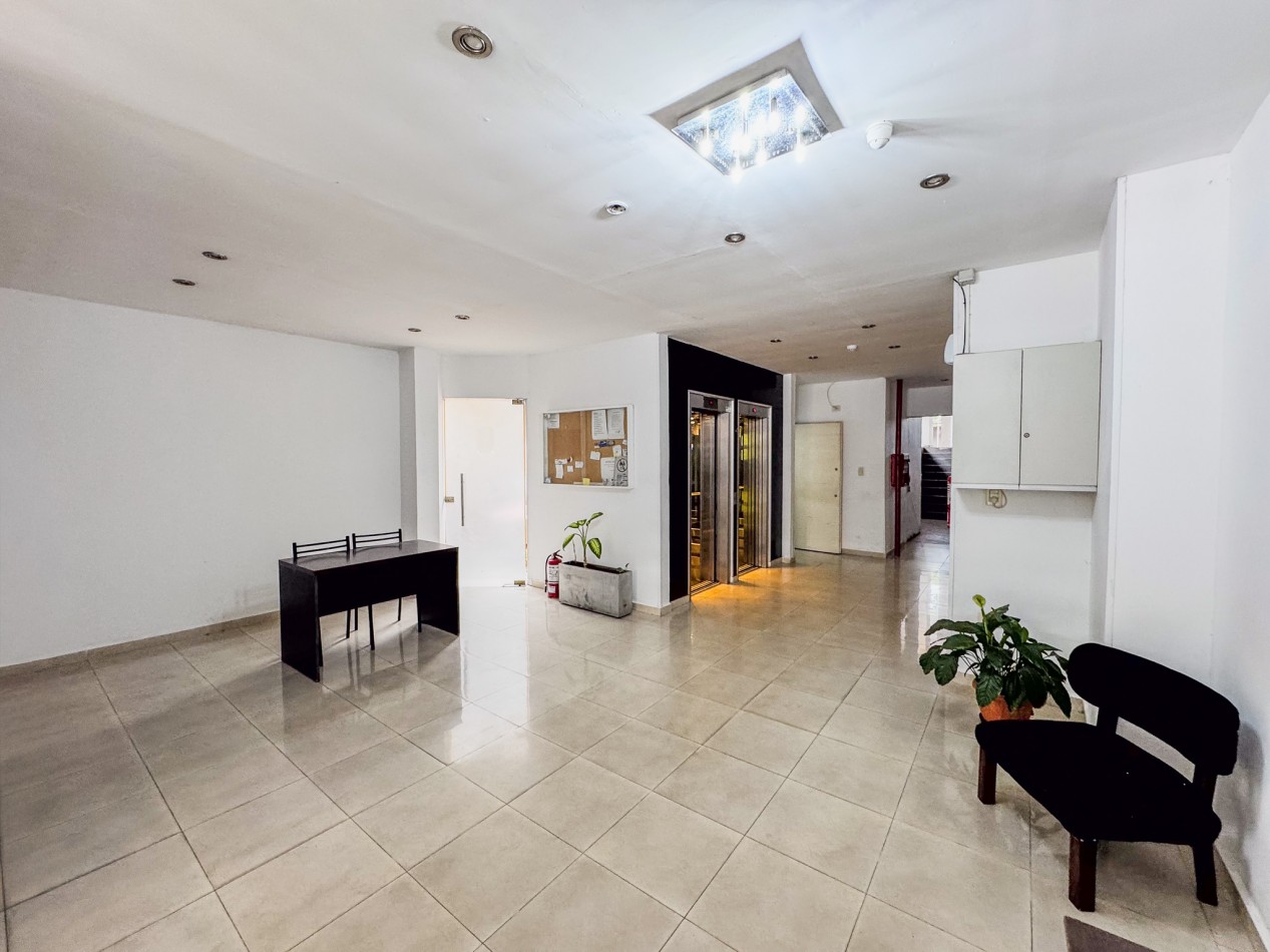 Departamento 2 Dorm + Cochera en Macrocentro | Piso 10 con Vista Abierta