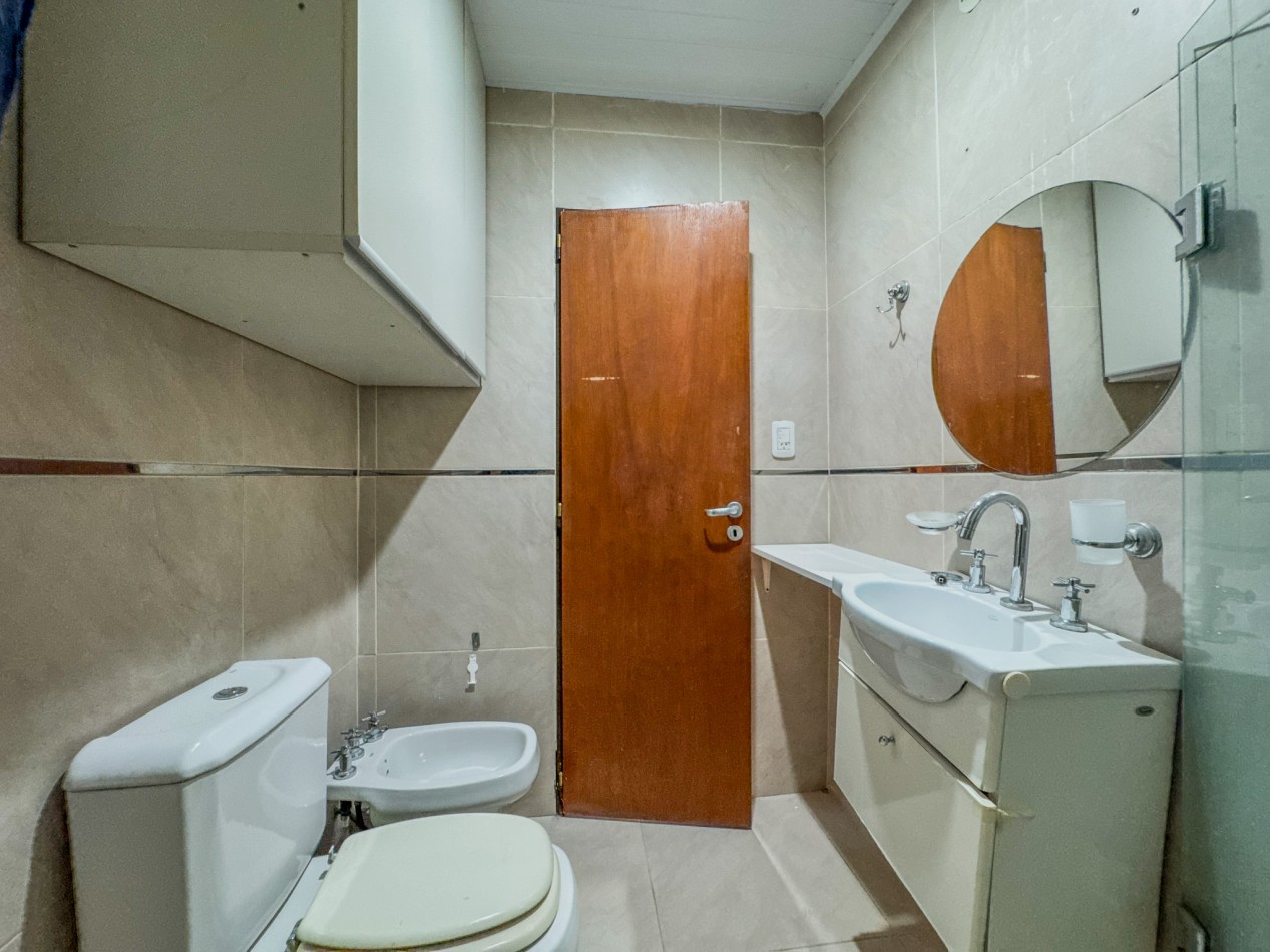 Departamento 2 Dorm + Cochera en Macrocentro | Piso 10 con Vista Abierta