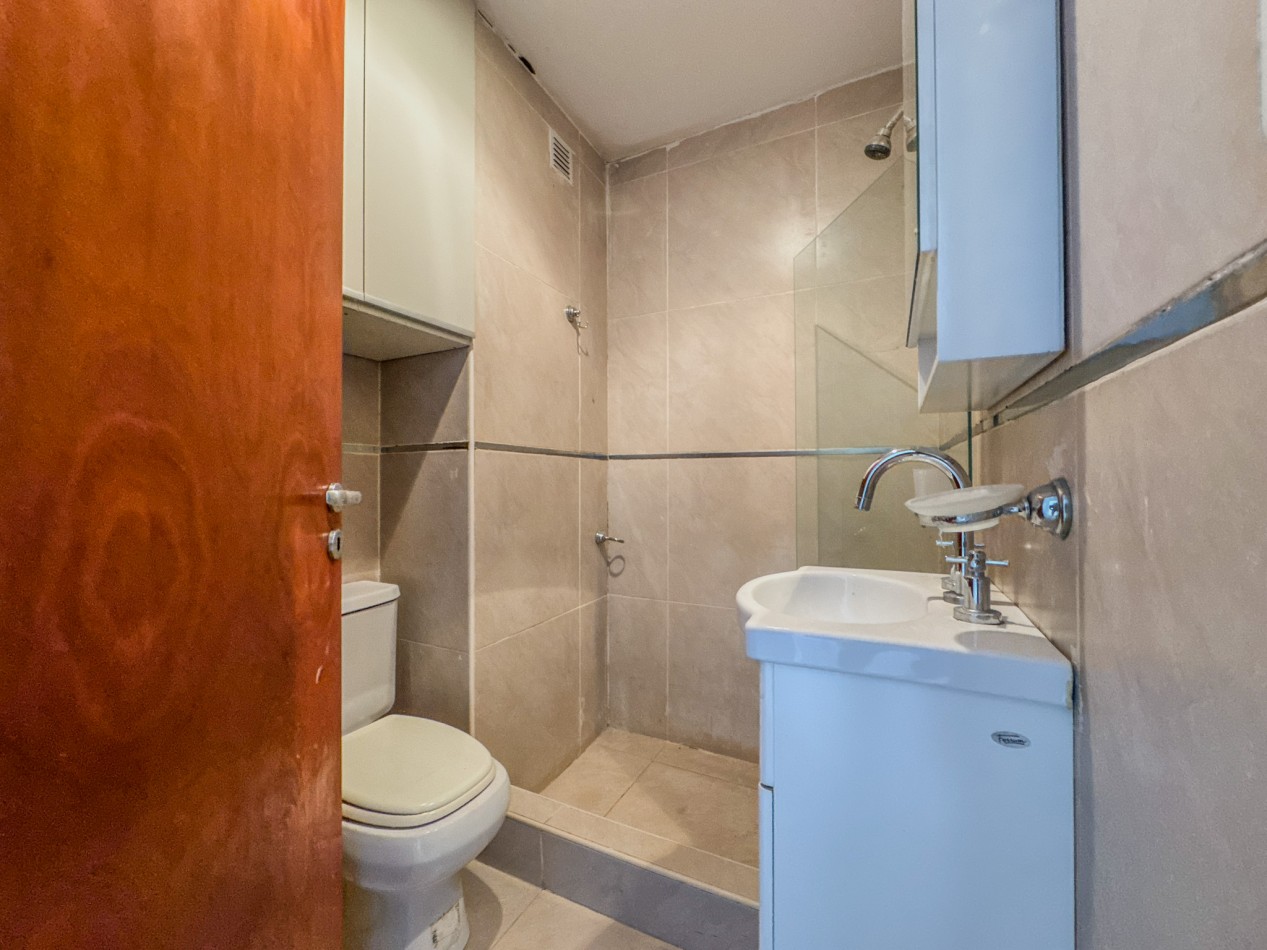 Departamento 2 Dorm + Cochera en Macrocentro | Piso 10 con Vista Abierta