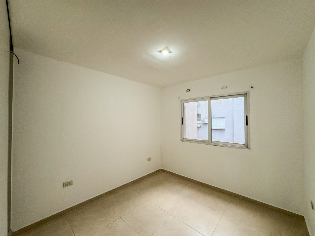 Departamento 2 Dorm + Cochera en Macrocentro | Piso 10 con Vista Abierta