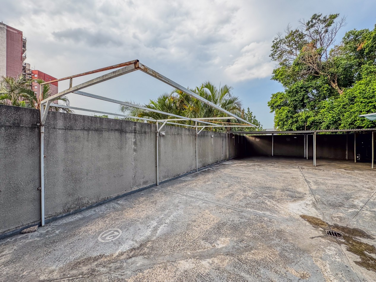 Departamento 2 Dorm + Cochera en Macrocentro | Piso 10 con Vista Abierta